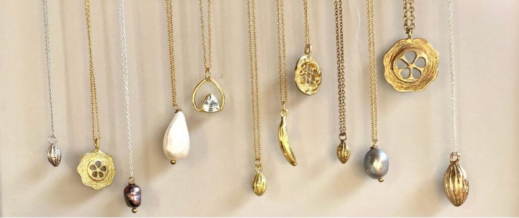 A row of handmade pendants hanging